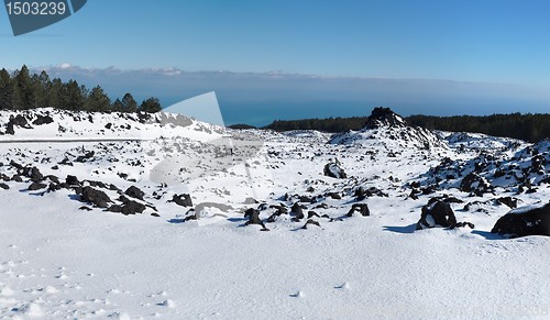 Image of Lava field covered with snow on Etna volcano, Sicily