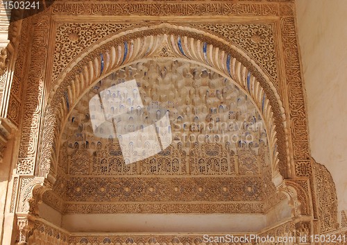 Image of Arabic stone engravings in the Alhambra palace in Granada, Spain