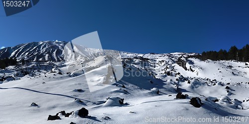 Image of Lava field covered with snow in winter on Etna volcano, Sicily