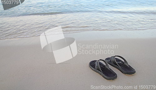 Image of flip flops on the beach