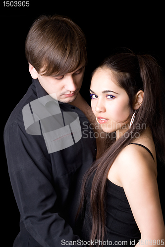 Image of Portrait of the young pair. Isolated on black