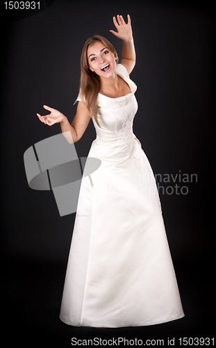 Image of beautiful young girl in a white gown