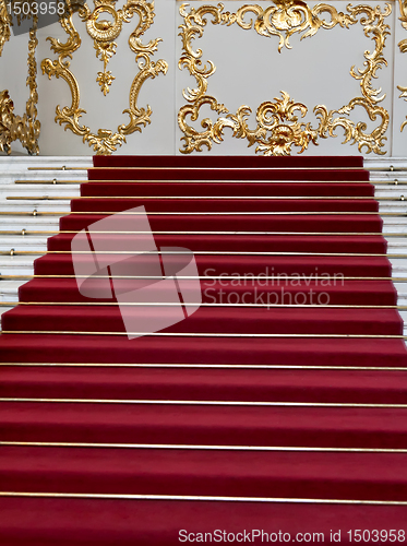 Image of red carpet on the marble staircase