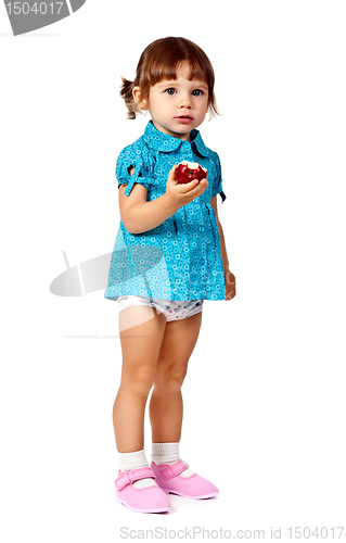 Image of little girl eating an apple
