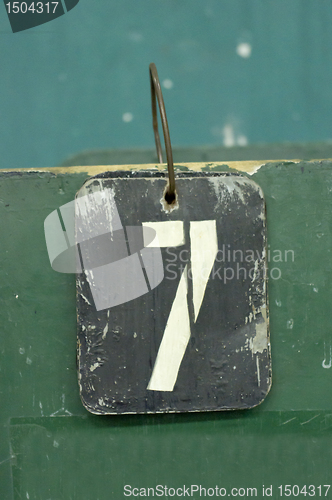 Image of number tag, seven