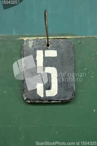 Image of number tag, five