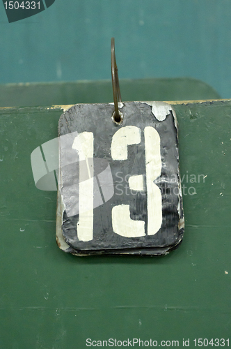 Image of number tag, thirteen