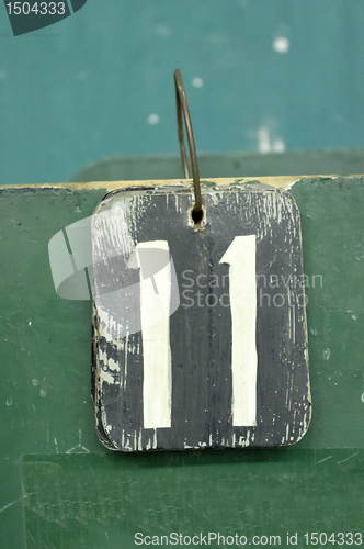 Image of number tag, eleven