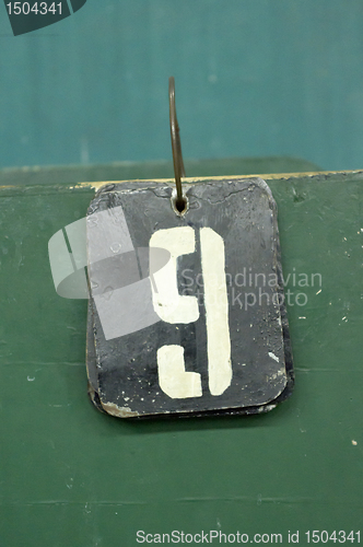 Image of number tag, nine