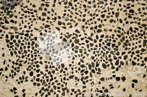 Image of Wall decorated with small flint stones backdrop