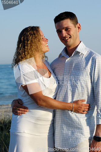 Image of Happy young couple at beach