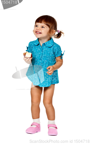 Image of little girl eating an apple