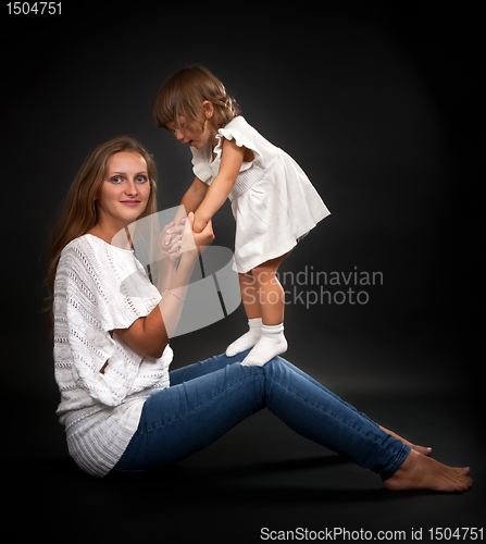 Image of Mom and baby daughter in the studio