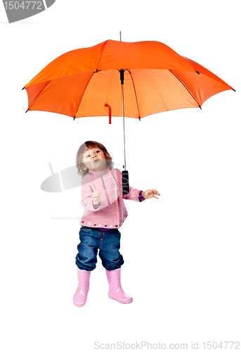 Image of little girl with an orange umbrella in the studio