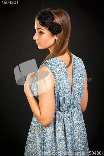 Image of portrait of a girl on a black background