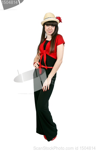 Image of Beautiful slim girl in a hat in studio