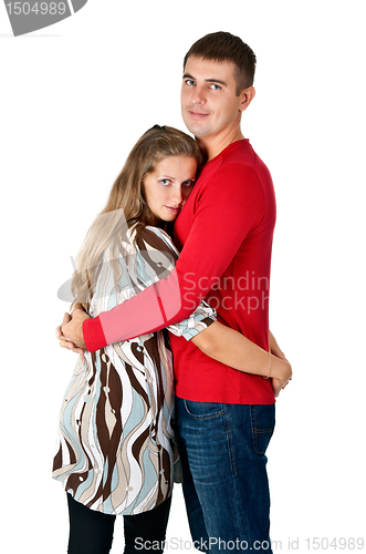 Image of girl hugging a guy in a red dress in the studio