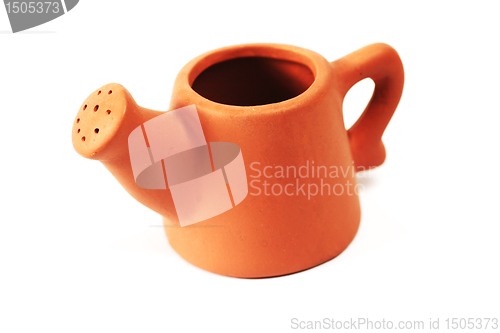 Image of close-up of small ceramic watering can 