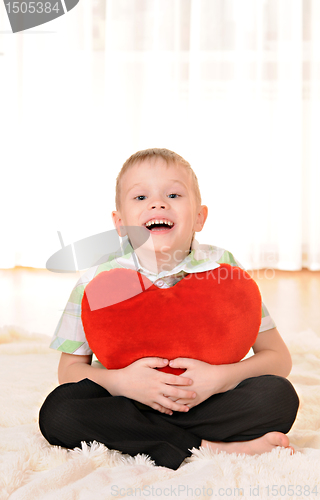 Image of child with a heart