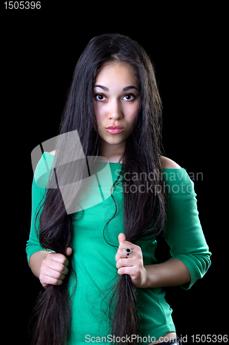 Image of Young puzzled woman