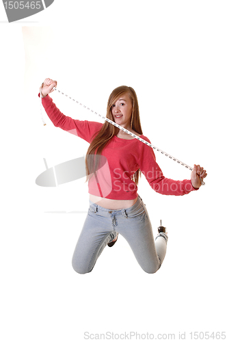 Image of Girl with measuring tape.