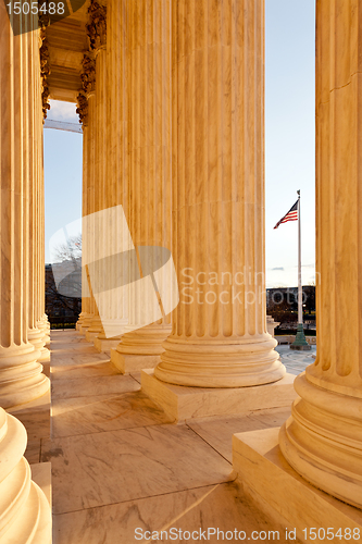 Image of Pllars of Supreme court and US Flag