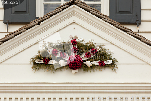 Image of Traditional xmas wreath above front door
