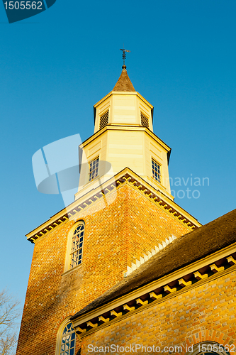 Image of Warm sunlight on Bruton parish church tower