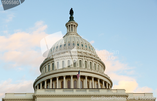 Image of Flag flies in front of Capitol in DC