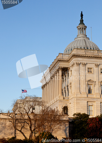 Image of Flag flies in front of Capitol in DC