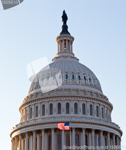 Image of Flag flies in front of Capitol in DC