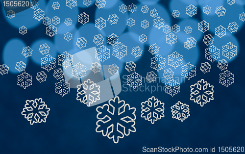 Image of Snowflake shapes against tree lights