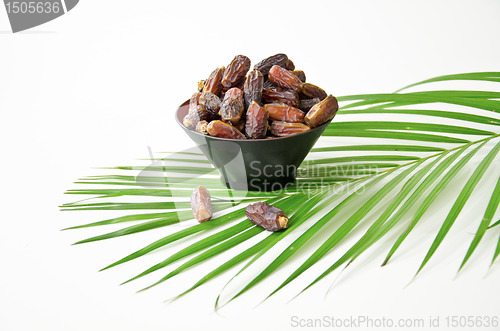 Image of Plate full of Dates Fruit isolated on white Background