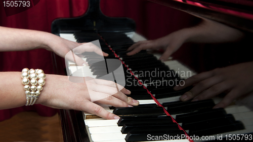 Image of Hands on Grand Piano