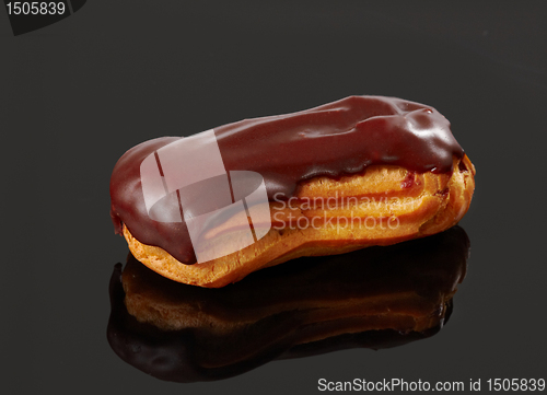 Image of eclair on black background