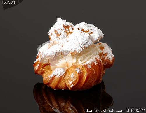 Image of cake on black background