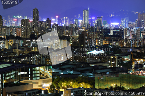 Image of Hong Kong with crowded buildings at night