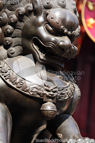 Image of Bronze lion in chinese temple