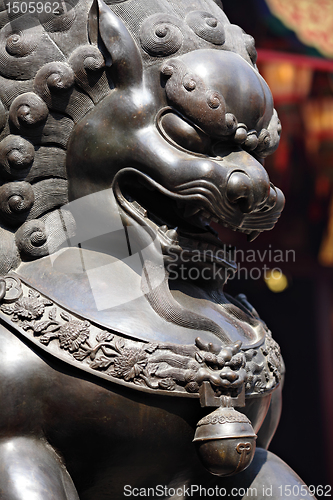 Image of Bronze lion in chinese temple