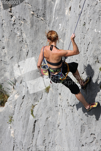Image of Female rock climber