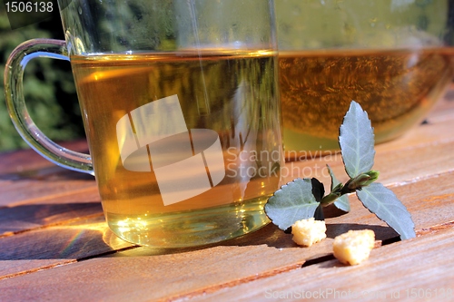 Image of fresh tea served outdoors