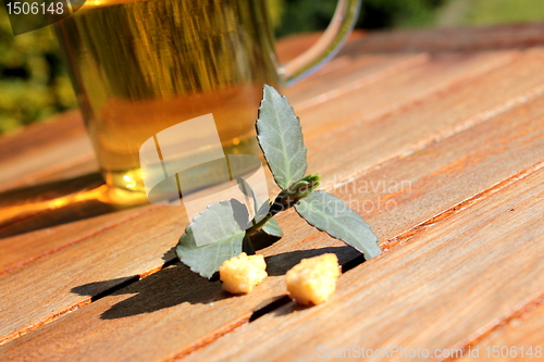 Image of fresh tea served outdoors