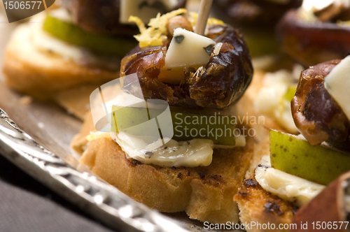 Image of Appetizer Plate with Dactyl, Pecan nuts and Cheese