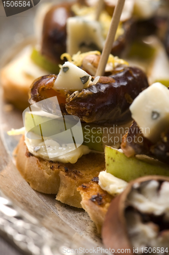 Image of Appetizer Plate with Dactyl, Pecan nuts and Cheese