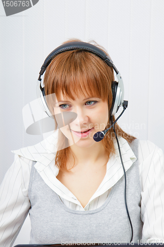 Image of girl in headphones with a microphone