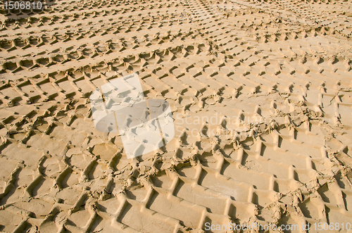 Image of Car wheel mark sand. Transport concept background