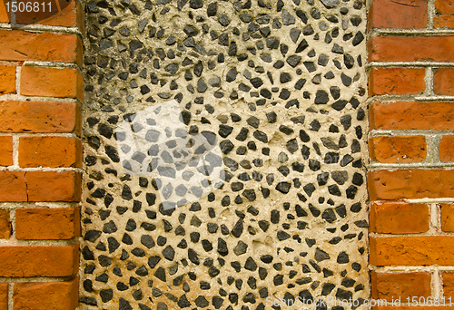 Image of Wall decorated pebble stones Architecture backdrop