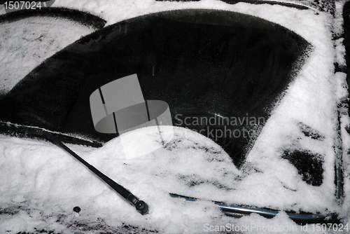 Image of car windshield with snow 