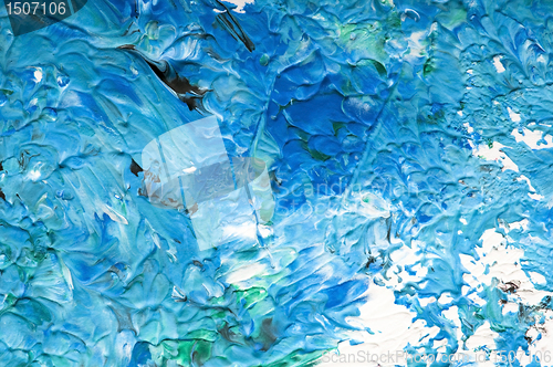 Image of paints on the white paper