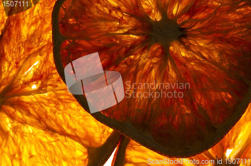 Image of dried orange slices isolated on white background 
